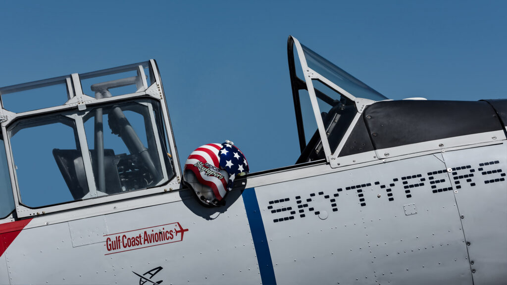 Geico Skytypers cockpit detail with pilot helmet